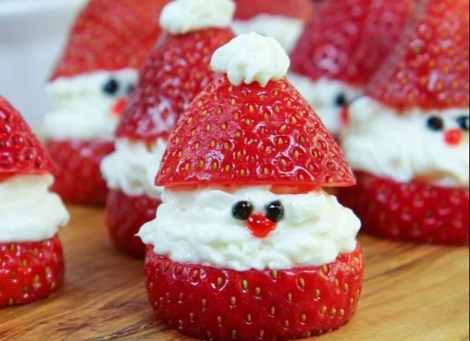 Festive Strawberry Santas filled with cheesecake for a holiday treat