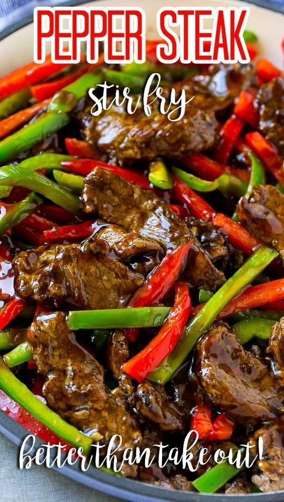 Delicious pepper steak stir fry with colorful vegetables in a wok