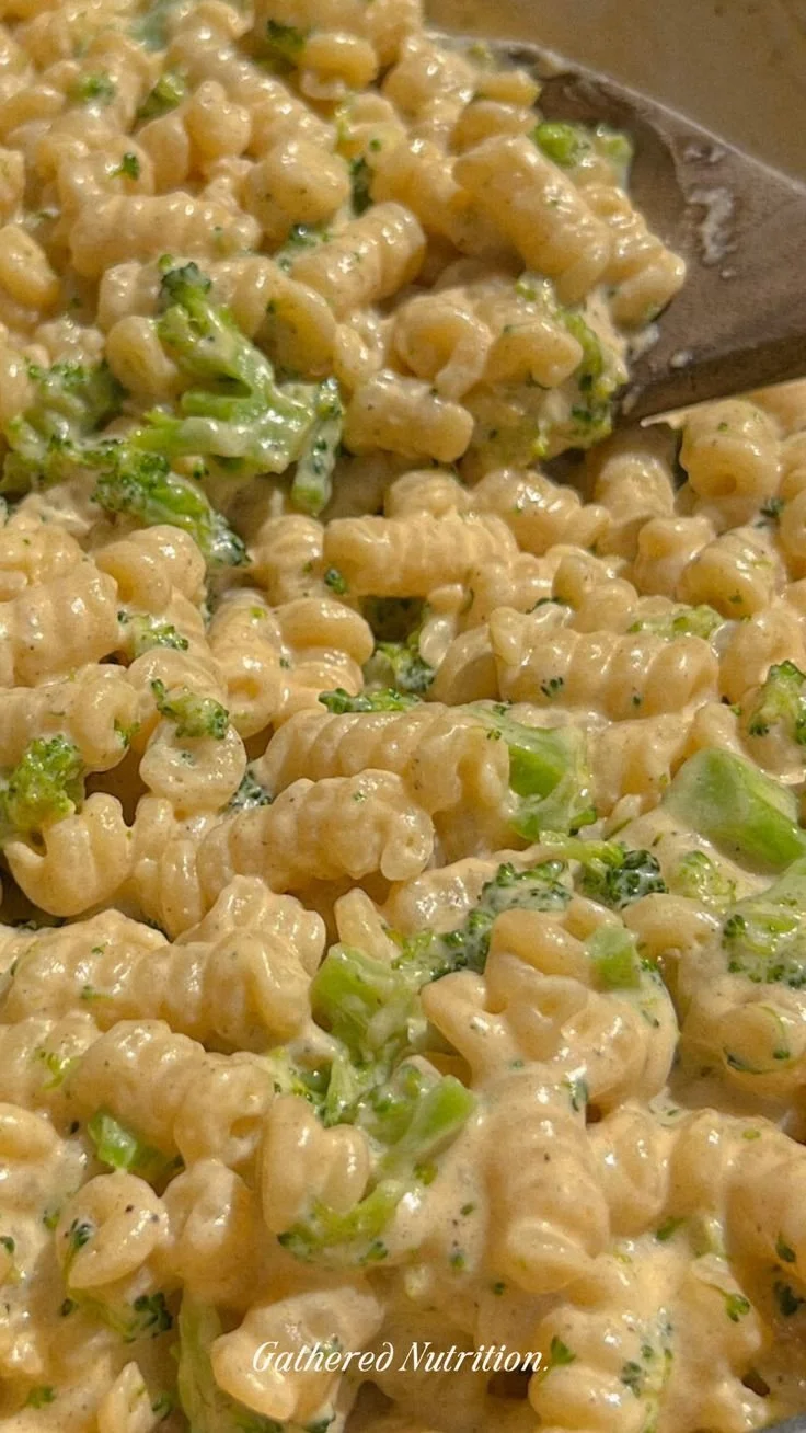 Plate of Protein Broccoli Mac and Cheese with broccoli and cheese sauce